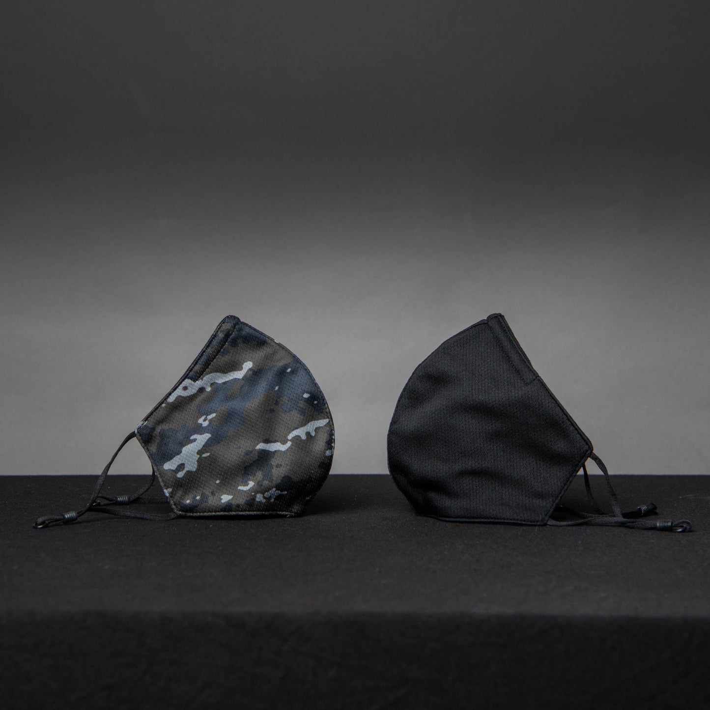 Adult Black/Camo Green Print Masks with Adjustable Ear Loops 2-Pack